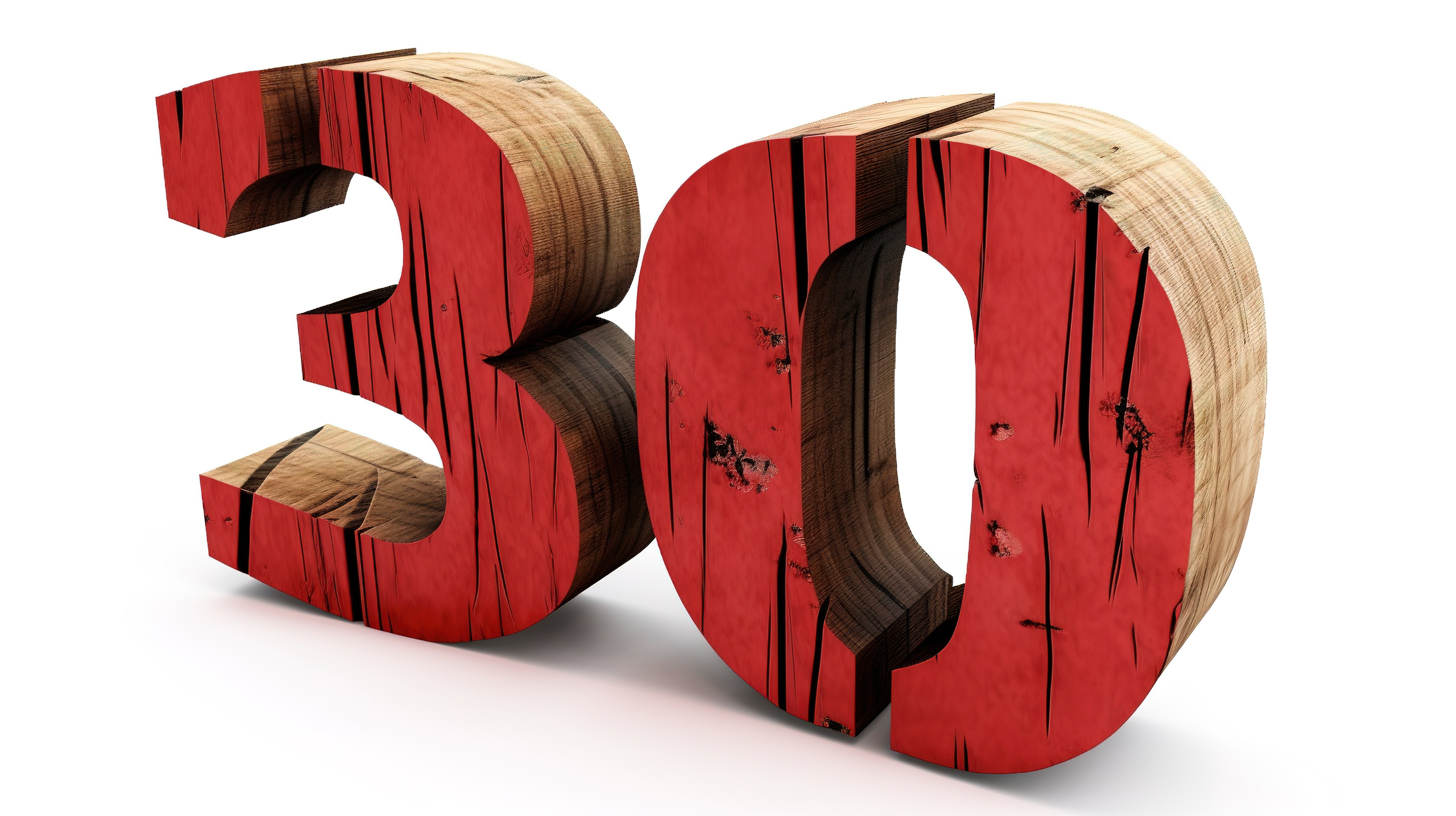 数字制作的木制“30”单独站立在白色背景上，显示裂缝和大胆的红色数字图片