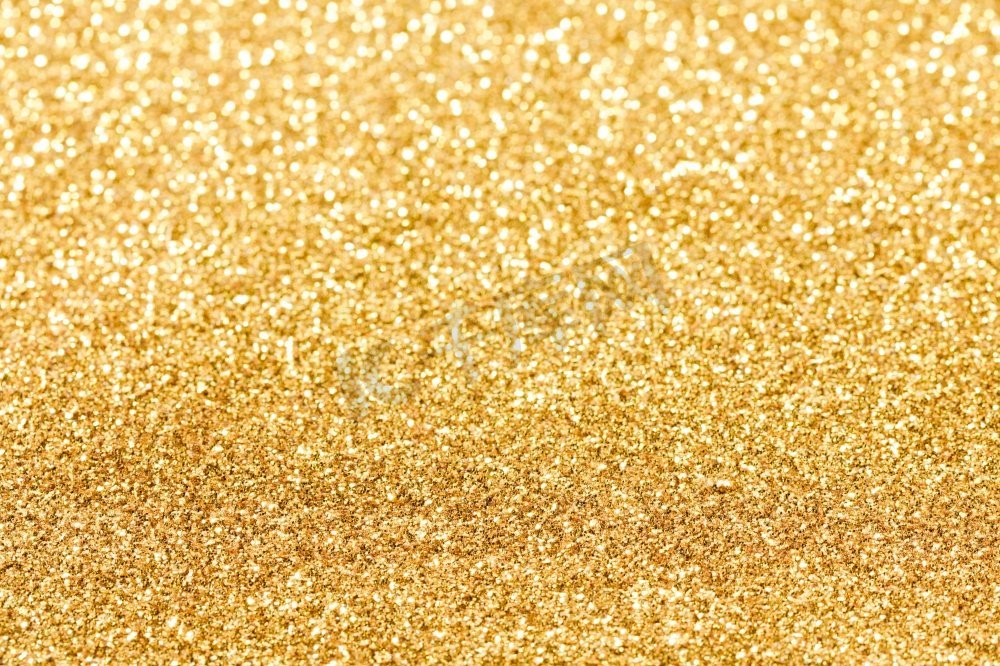 闪亮的金bokeh闪光的光抽象背景，圣诞节新年聚会庆祝概念。闪亮的金色灯光背景图片