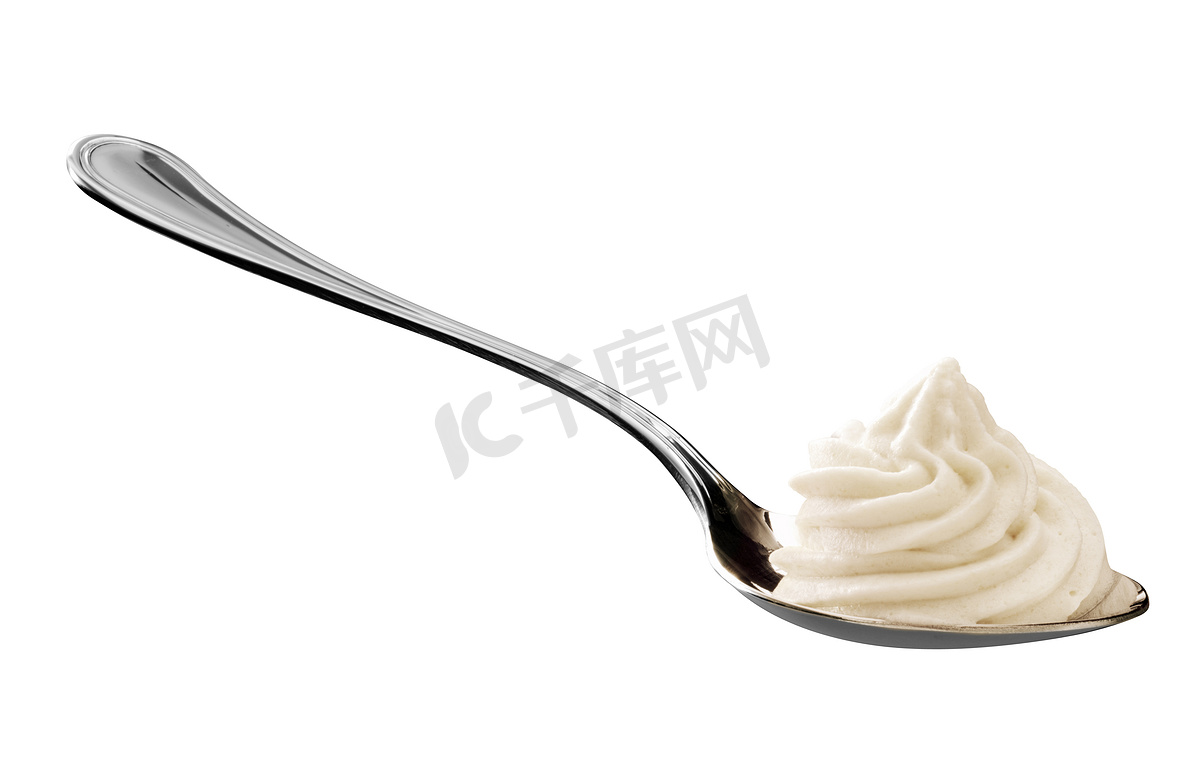 勺子上的生奶油图片