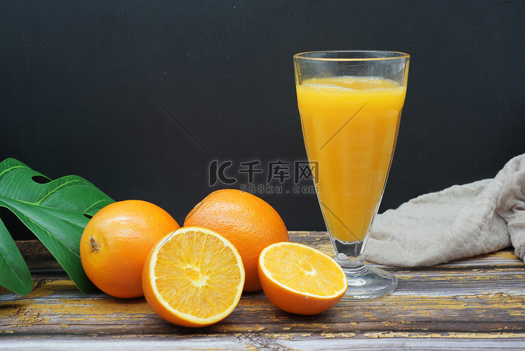 脐橙水果果汁摄影图