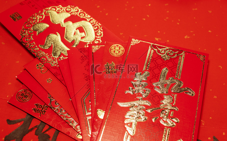春节喜庆红色背景红包摄影图