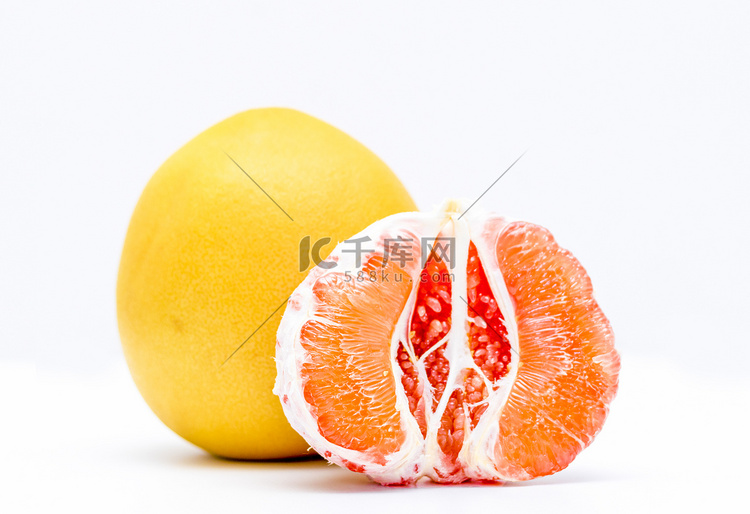 秋季水果红心柚子摄影图