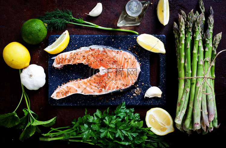 Salmon and spices on wooden table. Top view