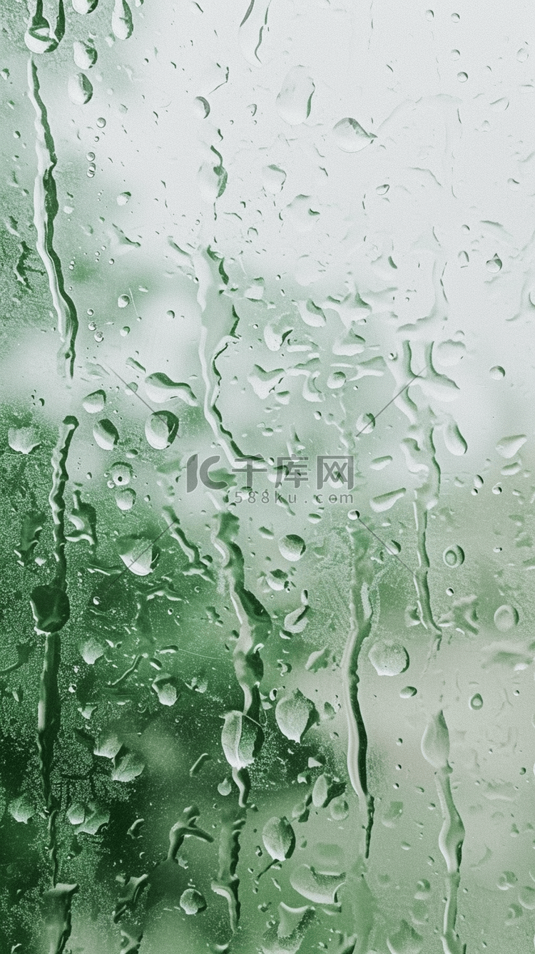 春天绿色玻璃窗上的雨点背景素材