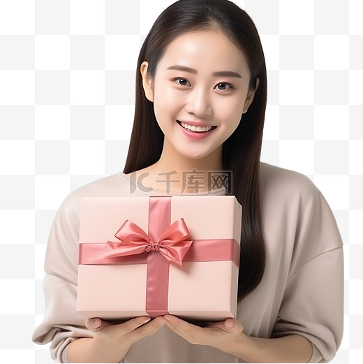 可爱的亚洲女孩在圣诞节庆祝活动中收到礼物，手里拿着漂亮的礼盒，惊喜不已图片