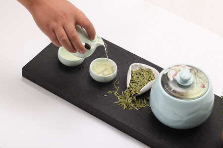 羊脂玉白瓷茶具摄影图