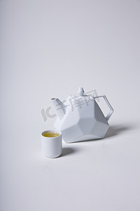 白色茶壶茶杯摄影图 