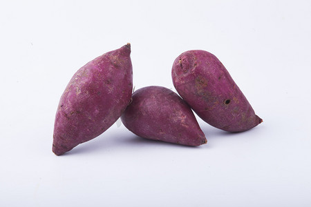 软糯香甜新鲜紫薯摄影图