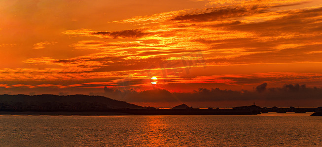 福建电力摄影照片_福建漳州市半月湾夕阳自然风景摄影图