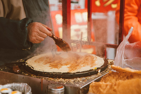 天津煎饼果子摄影照片_天津煎饼果子摄影图