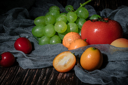 提子金桔番茄水果食物摄影图