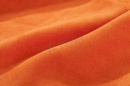 质感丝绸摄影照片_橙布料纹理