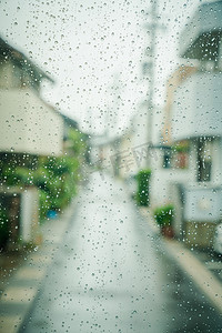 清明摄影摄影照片_透过窗户看的雨中街道摄影图