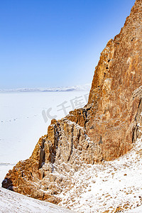 蓝天雪地摄影照片_雪地山岩摄影图