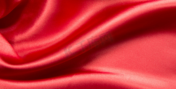 摄影照片_红色丝绸缎海报背景
