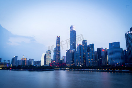 地产开盘海报素材摄影照片_夕阳下的珠江新城摄影图