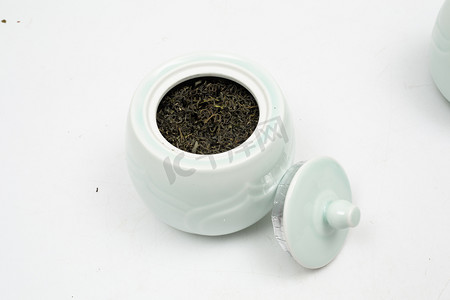 正山小种摄影照片_特写红茶茶叶茶罐摄影图配图
