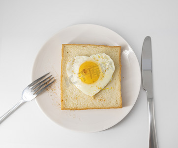 面包鸡蛋早餐摄影图