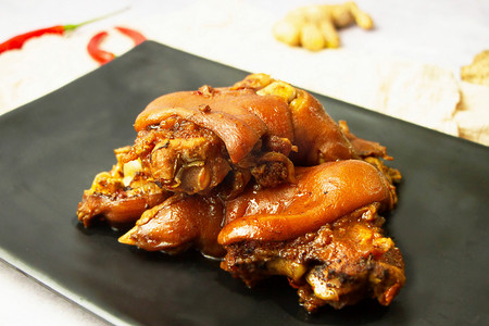 中式美食卤菜卤猪蹄猪脚摄影图