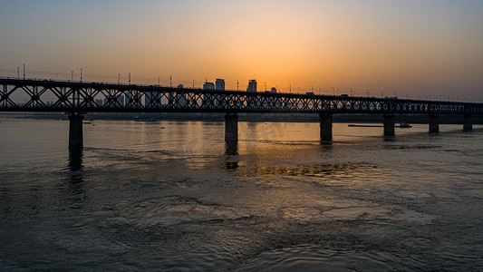 桥摄影照片_武汉长江大桥城市日落大气航拍实拍图摄影图