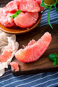 美食水果柚子果肉摄影图