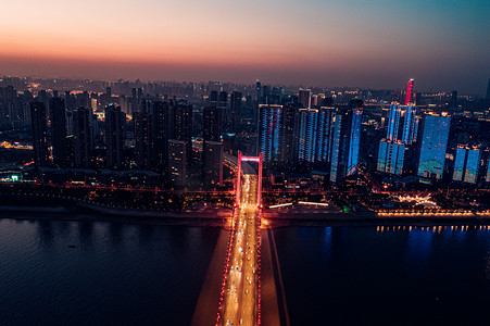 武汉城市建筑鹦鹉洲大桥日落航拍摄影图