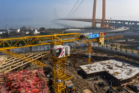 在建工程摄影照片_武汉城市建筑白天工地杨泗港大桥航拍摄影图配图