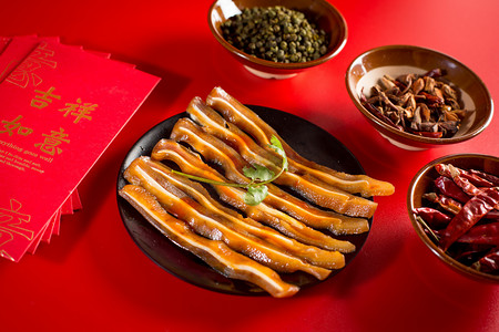 喜庆年味中国风卤菜猪耳朵摄影图配图