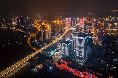 写字楼夜景摄影照片_武汉城市建筑群夜景城市建筑沙湖汉街航拍摄影图配图