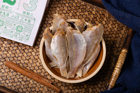 风干鸡广告摄影照片_美食食材红娘鱼干干货海鱼干摄影图配图
