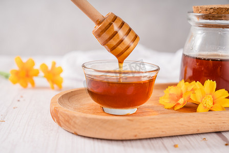 营养美食摄影照片_食品健康营养蜂蜜花蜜摄影图配图