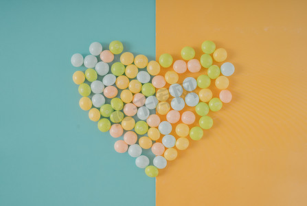 糖果零食糖豆食品心形摆拍摄影图配图