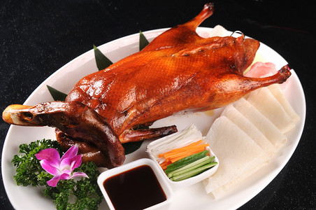 饭店包装摄影照片_北京烤鸭中国传统美食高清实物图片