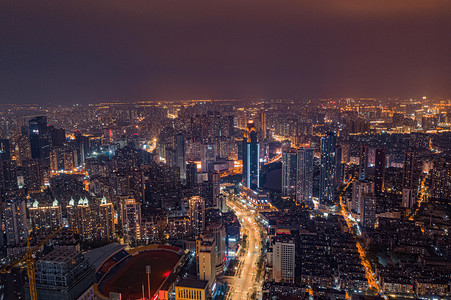 写字楼夜景摄影照片_武汉城市建筑群夜晚城市夜景西北湖俯视航拍摄影图配图