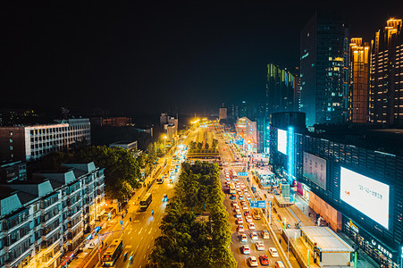 马路俯视摄影照片_武汉城市交通夜晚交通光谷航拍俯拍摄影图配图