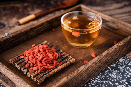 药食摄影照片_药材枸杞食材健康枸杞茶摄影图配图