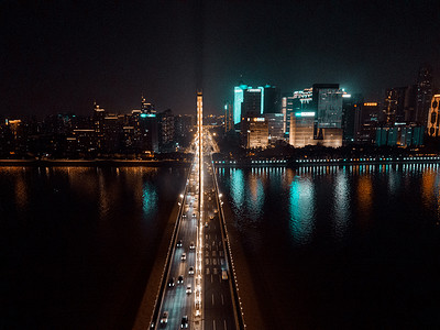 长沙湘江摄影照片_航拍长沙橘子洲大桥夜景摄影图配图