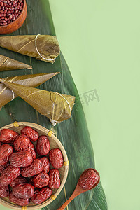 端午节粽子美食创意绿色背景摄影图配图