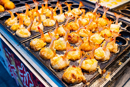 餐饮烧烤摄影照片_特色美食夜晚虾扯蛋户外无摄影图配图