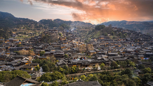 夕阳西江千户苗寨全景风光景区摄影图配图