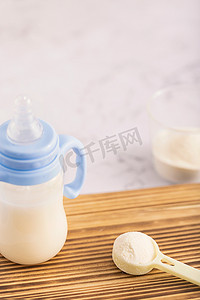 奶粉母婴用品奶瓶静物摄影图配图