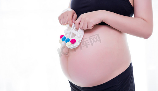 怀孕孕妈咪三胎孕妇二胎摄影图配图