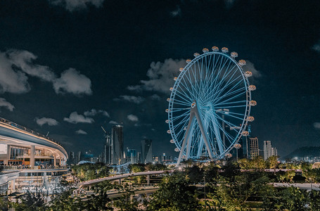 度假建筑摄影照片_城市建筑摩天轮夜景风光摄影图配图