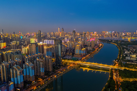 写字楼夜景摄影照片_武汉城市建筑群夜晚建筑群硚口区航拍摄影图配图