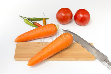 切菜板胡萝卜摄影图