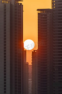 金色建筑杭州摄影照片_落日傍晚太阳落日落日摄影图配图