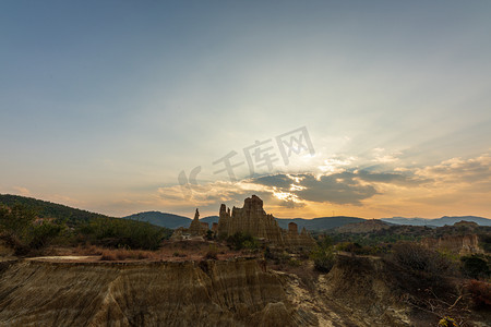 土林摄影照片_日落土林夕阳天空室外旅游摄影图配图