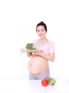 孕妇饮食摄影照片_生活方式孕妇减肥家居饮食摄影图配图