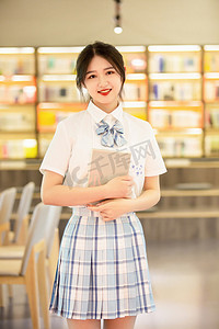 图书馆读书美女学生制服摄影图配图