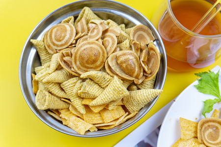 零嘴食材猫耳朵美味休闲食品摄影图配图